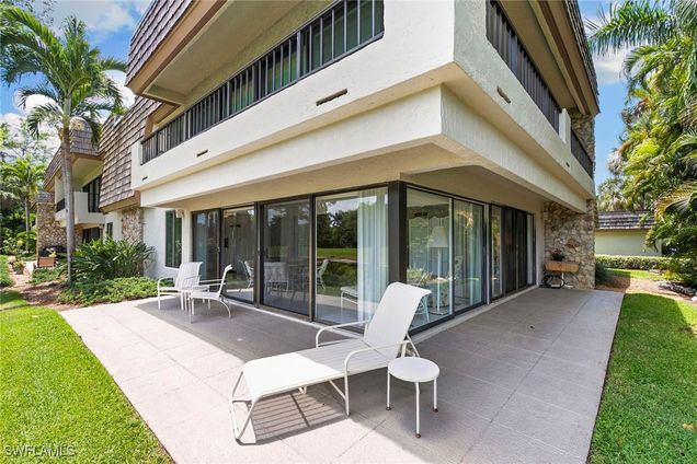 105 Wilderness Drive Unit B105 Naples, FL Condo Active - Photo 1 of 37. Opens carousel modal