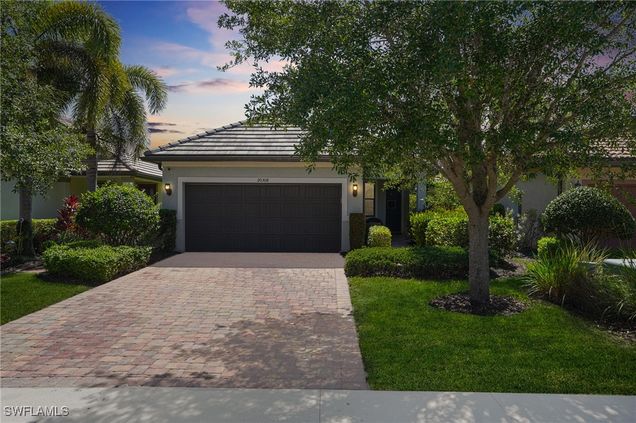 20308 Corkscrew Shores Boulevard Estero, FL House Active - Photo 1 of 47. Opens carousel modal