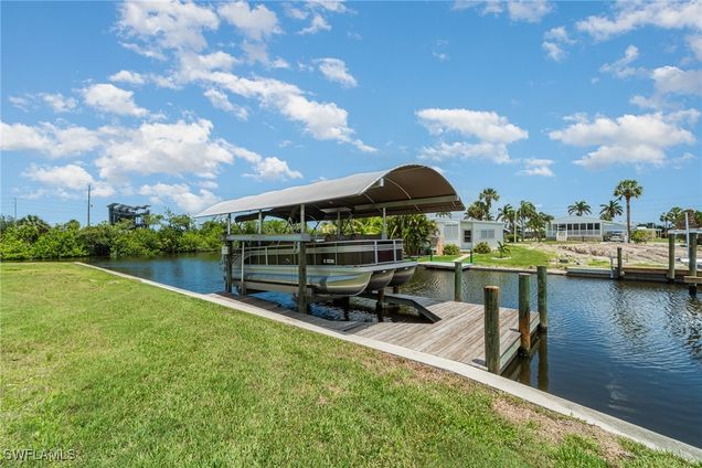 11410 Bougainvillea Lane Fort Myers Beach, FL Plot of land Active - Photo 1 of 12. Opens carousel modal