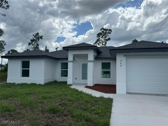 322 Mcarthur Boulevard Lehigh Acres, FL House Active - Photo 1 of 25. Opens carousel modal