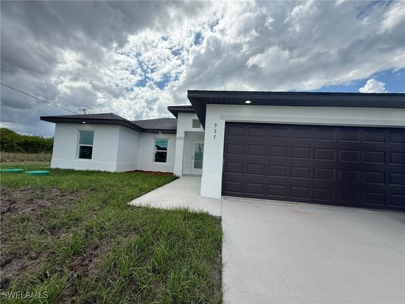 937 Grant Boulevard Lehigh Acres, FL House Active - Photo 1 of 30. Opens carousel modal
