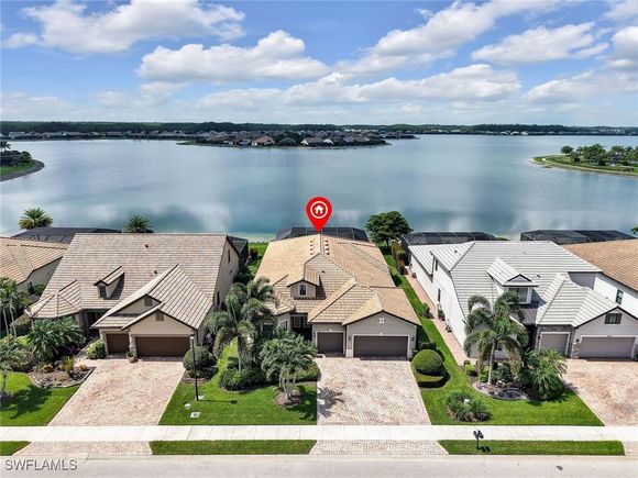 20945 Corkscrew Shores Boulevard Estero, FL House Active - Photo 1 of 42. Opens carousel modal