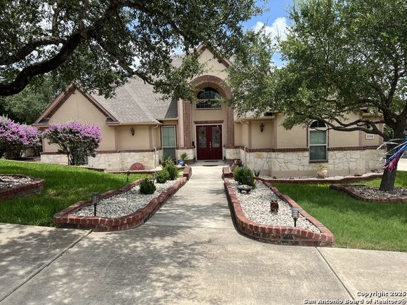 21918 PESA COVE Garden Ridge, TX House Active - Photo 1 of 56. Opens carousel modal