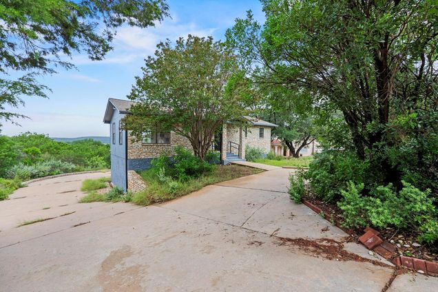 5100 Country Club Dr Lago Vista, TX House Active - Photo 1 of 39. Opens carousel modal