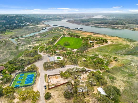 6711 Bar K Clubhouse Ct Lago Vista, TX Plot of land Active - Photo 1 of 40. Opens carousel modal