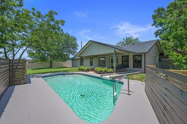 7301 Berkman Dr Austin, TX House Active - Photo 1 of 40. Opens carousel modal