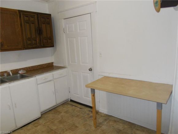 1217 E Washington Street Greensboro, NC House Sold - Photo 1 of 11. Opens carousel modal