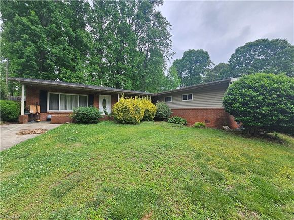 4004 S Fremont Drive Greensboro, NC House Pending - Photo 1 of 24. Opens carousel modal