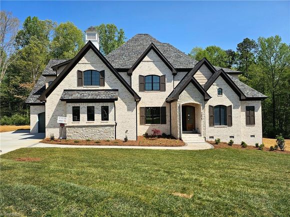 7020 Marseilles Court Summerfield, NC House Active - Photo 1 of 49. Opens carousel modal