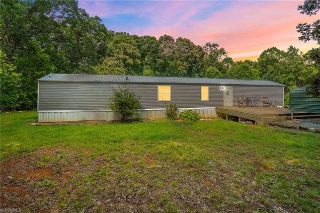 6242 Wild Horse Canyon Road Snow Camp, NC House Active - Photo 1 of 33. Opens carousel modal