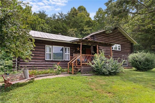 11126 Us Highway 421 Purlear, NC House Active - Photo 1 of 38. Opens carousel modal