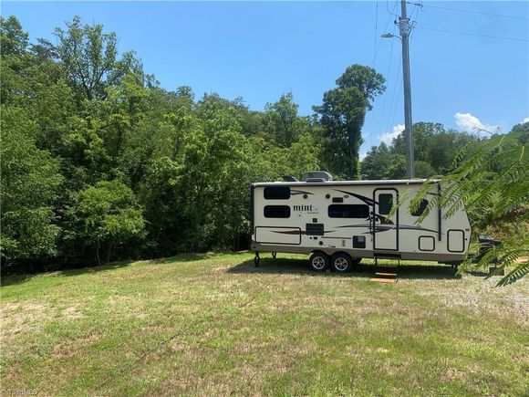 3258 Red White And Blue Road North Wilkesboro, NC Plot of land Active - Photo 1 of 16. Opens carousel modal