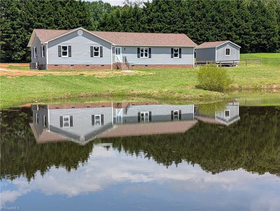 1410 Creekside Drive Randleman, NC House Active - Photo 1 of 25. Opens carousel modal
