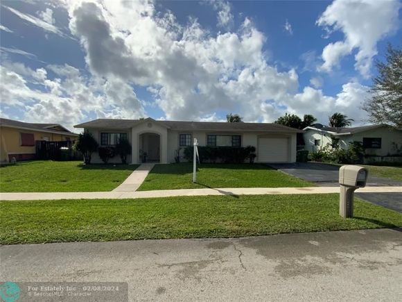 9440 NW 8th St Pembroke Pines, FL House Sold - Photo 1 of 12. Opens carousel modal