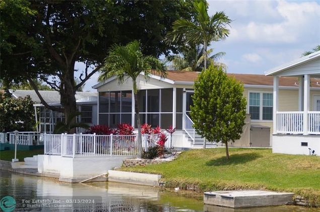 5420 Lagoon Dr Fort Lauderdale, FL House Active - Photo 1 of 38. Opens carousel modal