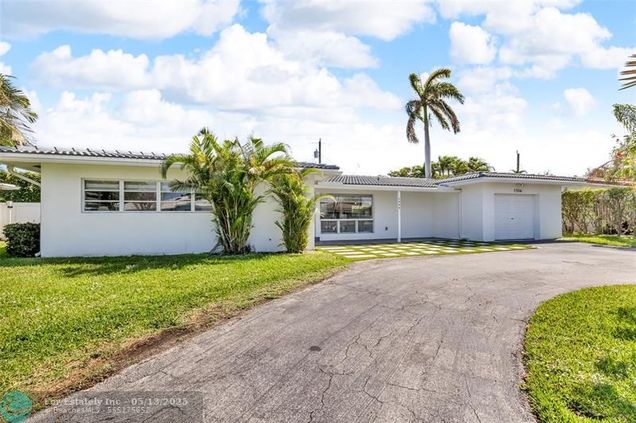 1556 SE 7th St Deerfield Beach, FL House Sold - Photo 1 of 54. Opens carousel modal
