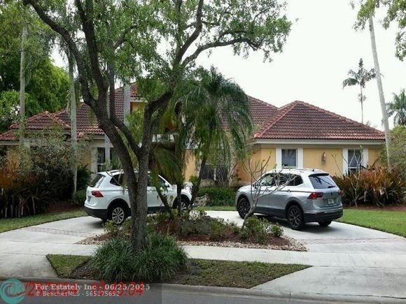 1030 Pine Branch Dr Weston, FL House Active - Photo 1 of 4. Opens carousel modal