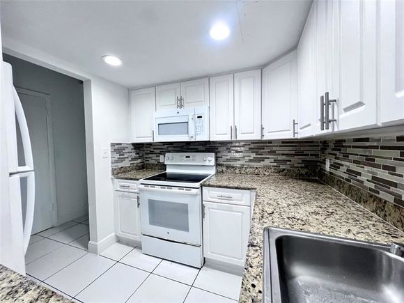 2580 NW 56th Ave Unit 500-205 Lauderhill, FL House Active - Photo 1 of 15. Opens carousel modal