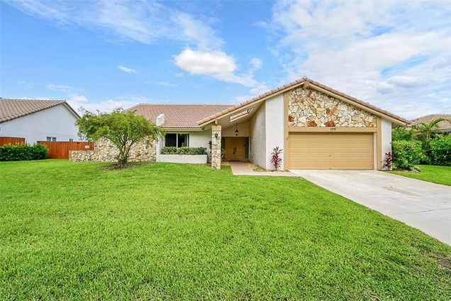 1291 NW 99th Avenue Plantation, FL House Active - Photo 1 of 52. Opens carousel modal
