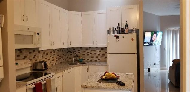 740 NW 47th St Deerfield Beach, FL House Active - Photo 1 of 11. Opens carousel modal