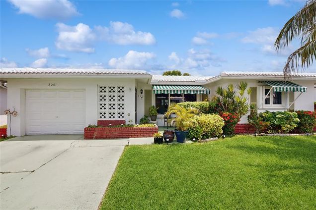 8201 NW 59th Ct Tamarac, FL House Active - Photo 1 of 31. Opens carousel modal