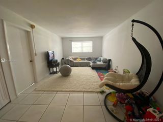 7440 Harding Ave Unit 203