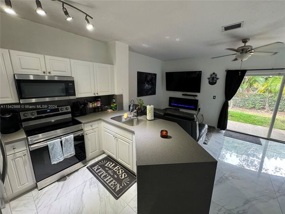 6411 Catalina Ln Unit 0 Tamarac, FL Townhouse Sold - Photo 1 of 21. Opens carousel modal