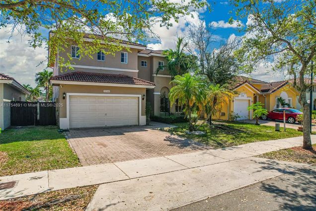 13168 SW 143 Te Miami, FL House Active - Photo 1 of 45. Opens carousel modal