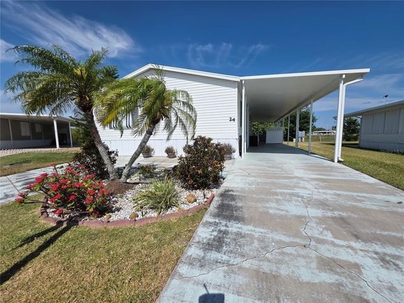 1601 SE Us Highway 441 #24 Okeechobee, FL House Pending - Photo 1 of 42. Opens carousel modal