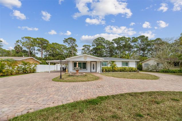 410 Forest Estate Dr West Palm Beach, FL House Sold - Photo 1 of 42. Opens carousel modal