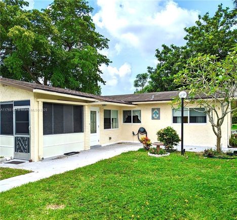 410 SW Natura Avenue Deerfield Beach, FL House Active - Photo 1 of 32. Opens carousel modal