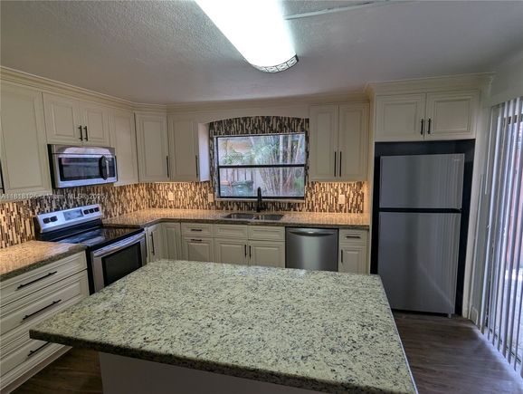 5825 Swordfish Ct Unit A Tamarac, FL House Active - Photo 1 of 28. Opens carousel modal