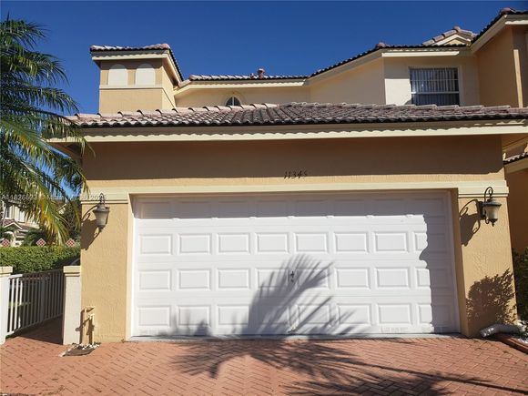 11345 NW 55th Ln Unit 11345 Doral, FL Townhouse Active - Photo 1 of 26. Opens carousel modal