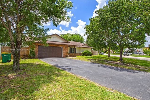 8022 NW 84th Ter Tamarac, FL House Active - Photo 1 of 50. Opens carousel modal