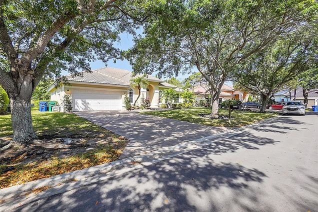 1574 NW 103rd Ter Coral Springs, FL House Active - Photo 1 of 83. Opens carousel modal