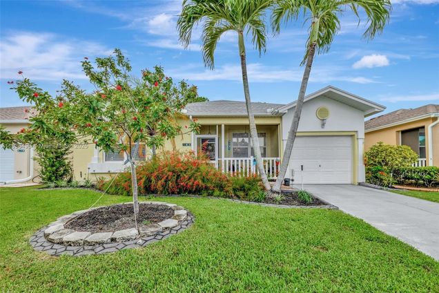 568 NW Cortina Ln Port St Lucie, FL House Active - Photo 1 of 37. Opens carousel modal