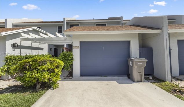 1629 Woodbridge Lakes Cir West Palm Beach, FL House Active - Photo 1 of 16. Opens carousel modal