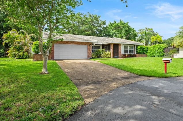 2250 NW 41st Ave Coconut Creek, FL House Active - Photo 1 of 35. Opens carousel modal