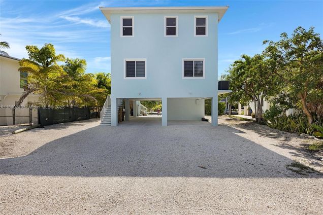 142 Peg Leg Ln Lower Keys, FL House Active - Photo 1 of 77. Opens carousel modal