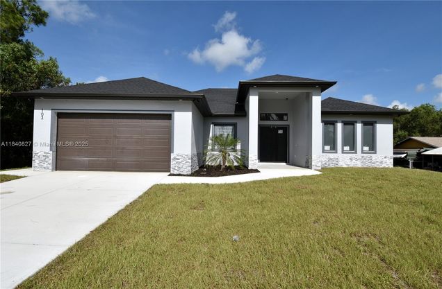 103 Scott Ave Lehigh Acres, FL House Active - Photo 1 of 33. Opens carousel modal