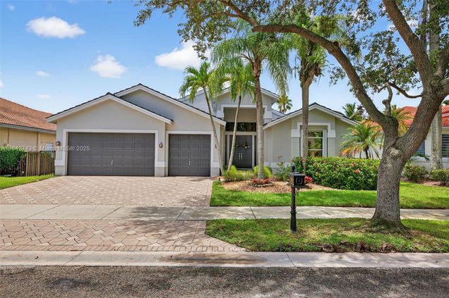 1347 Ginger Cir Weston, FL House Active - Photo 1 of 76. Opens carousel modal