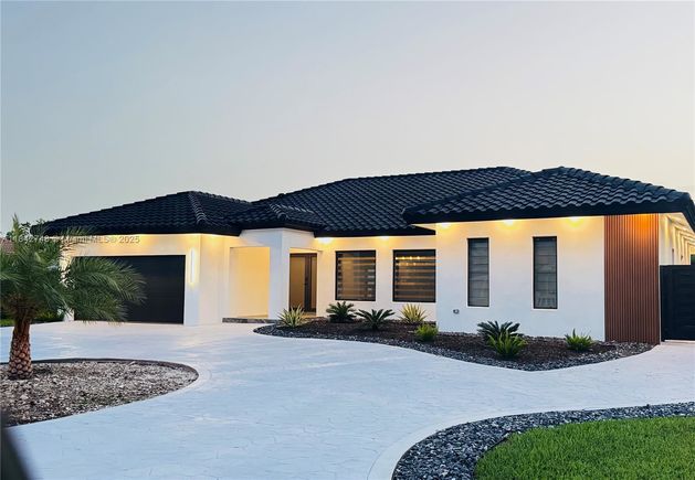19614 SW 133rd Ct Miami, FL House Active - Photo 1 of 79. Opens carousel modal