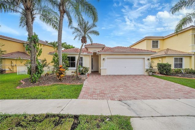 13122 SW 30th St Miramar, FL House Active - Photo 1 of 64. Opens carousel modal