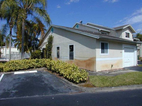 5847 Woodlands Bl Unit 5847 Tamarac, FL House Sold - Photo 1 of 12. Opens carousel modal