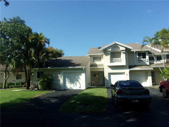 5827 Woodlands Bl Unit 5827 Tamarac, FL Townhouse Sold - Photo 1 of 9. Opens carousel modal