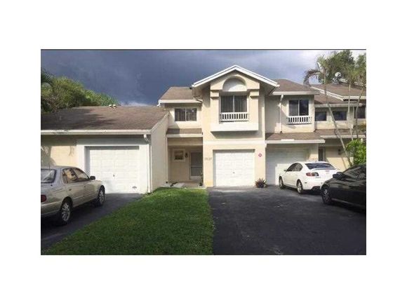 5827 Woodlands Bl Unit 0 Tamarac, FL Townhouse Sold - Photo 1 of 9. Opens carousel modal