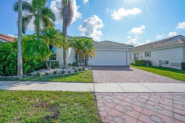 2206 Country Golf Drive Wellington, FL House Sold - Photo 1 of 35. Opens carousel modal