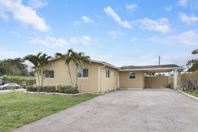 827 Caroline Avenue West Palm Beach, FL House Active - Photo 1 of 34. Opens carousel modal
