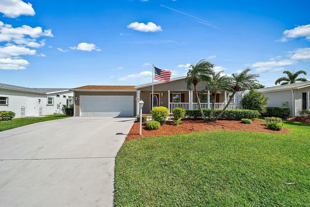 7724 White Egret Lane Port Saint Lucie, FL House Active - Photo 1 of 51. Opens carousel modal