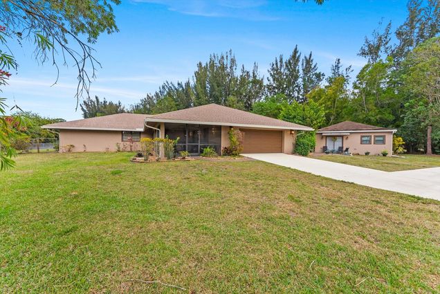 6028 140th Avenue N The Acreage, FL House Active - Photo 1 of 86. Opens carousel modal